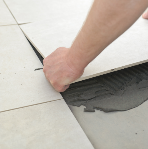 Jarolik-Flooring-and-Tile-Central-TX-Home-Customer-Service-Laying-Tile